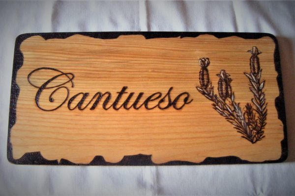 Cartel pirograbado Cantahueso